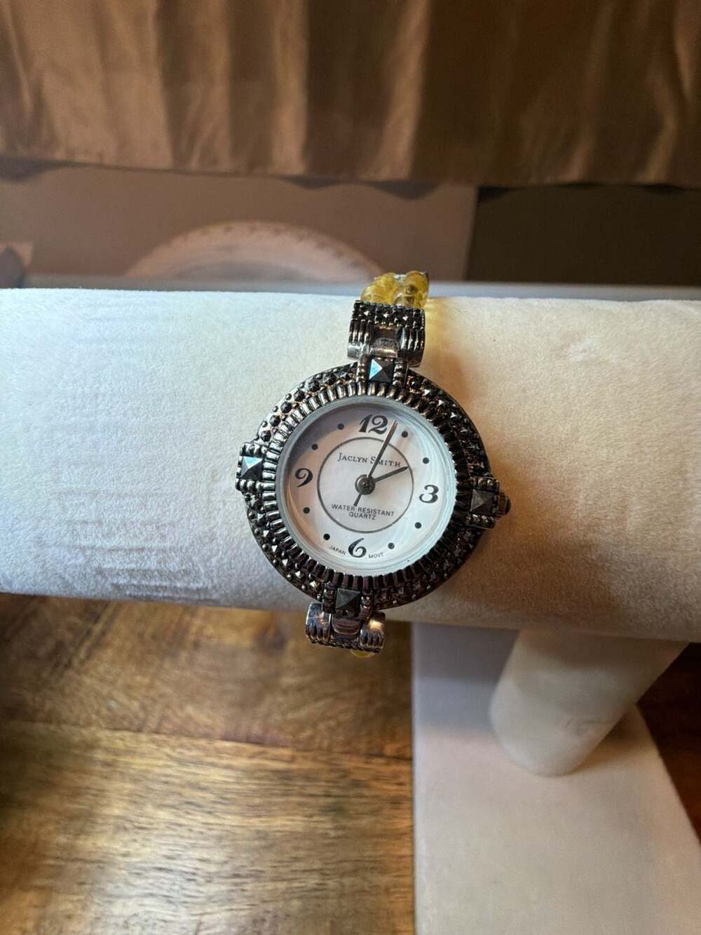 Jaclyn Smith Women's Round Marcasite-Style Quartz Bracelet Watch with Yellow Bea